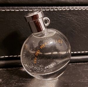 Mini Hermes eau des merveilles perfume bottle. Small sample, travel perfume full